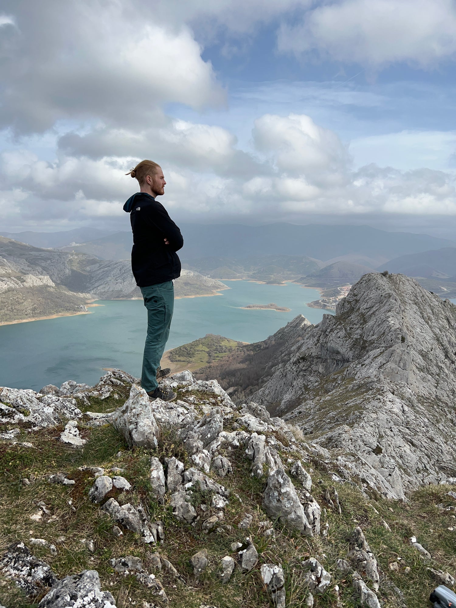 Logan Turner standing on a ridgeline in Spain during a photoscanning trip
